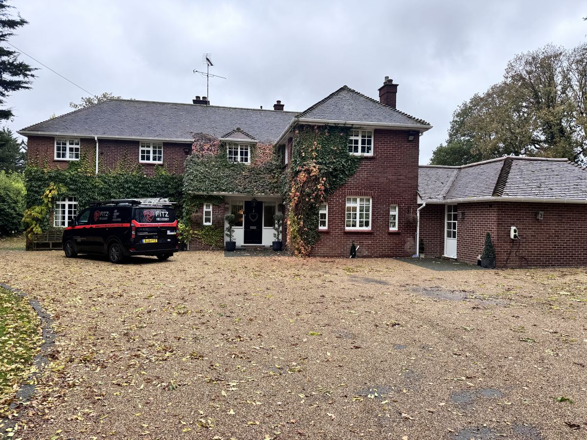 Detached house with a FITZ FIRE & SECURITY van on the driveway
